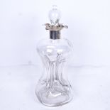 A large glass decanter and stopper of waisted form, with silver collar, height 31cm