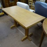 A contemporary Arts and Crafts style oak refectory dining table, L130cm, H74cm, D60cm