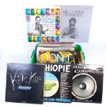 A quantity of LP records, including Atarah's Band, Eric Clapton and James Moody, and music related