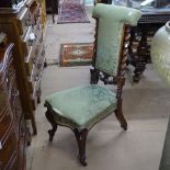 A Victorian upholstered prayer chair, with barley twist columns and cabriole legs
