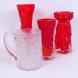 A group of 3 Whitefriars style red glass vases, and a bark design mug with polished pontil,