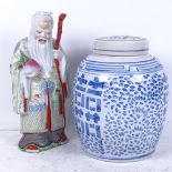 A Chinese porcelain figure of a Sage, height 29cm, and a modern Chinese blue and white porcelain jar