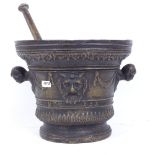A large and heavy reproduction relief cast bronze mortar and pestle, Classical moulded decoration,