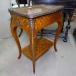 A kingwood and walnut 2-tier table of rectangular form, with end frieze drawer, ormolu mounts, on