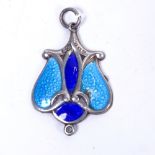 An Art Nouveau silver and coloured blue enamel pendant of stylised design, width 2cm