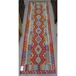 A Choli Kilim runner, 250cm x 69cm