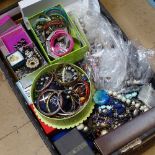A large quantity of costume jewellery and wristwatches