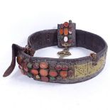 An unusual agate and stone set leather belt with brass mounts and panels, width 7cm (A/F)