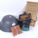 A Second World War Period British Army Brodie steel helmet, an ARP first aid pouch, and a