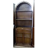 An oak dome-top dresser with open shelves, drawer and cupboards under, W70cm, H183cm