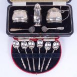 A 3-piece silver cruet set, boxed, and a cased set of 6 silver coffee spoons, original box