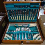 A mid-century canteen of silver plated cutlery for 6 people, including carving set, in fitted