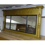 A Victorian giltwood triple-mirror over mantel, with split turned columns and applied decoration,