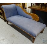 An Edwardian upholstered chaise longue with carved show wood, on turned legs, L170cm