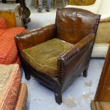 WITHDRAWN - An early 20th century studded leather upholstered Club chair, with velvet cushion
