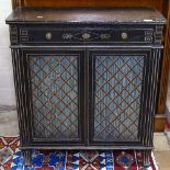 An Aesthetic ebonised side cabinet, with single drawer and painted panelled doors, and beaded