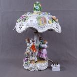 A Continental porcelain lamp with 4 children figures, height 38cm