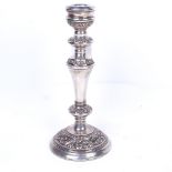 An embossed silver single candlestick, Birmingham 1975, height 22.5cm