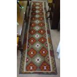 A Mamainer Kilim runner, 377cm x 86cm