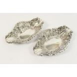 Pair of late Victorian silver bonbon dishes, London 1896, boat shaped, pierced and repousse