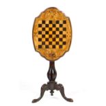 Victorian walnut and inlaid tilt top games table, circa 1850, the shaped top centred with a