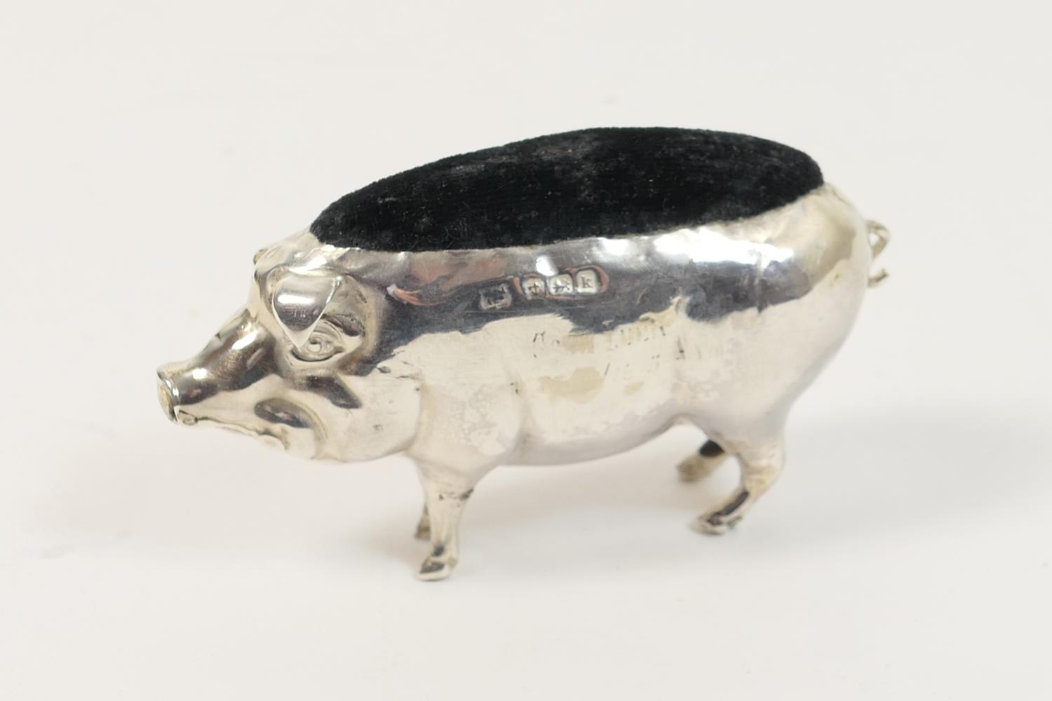 Edwardian silver pig form pin cushion, Birmingham 1909, 8cm