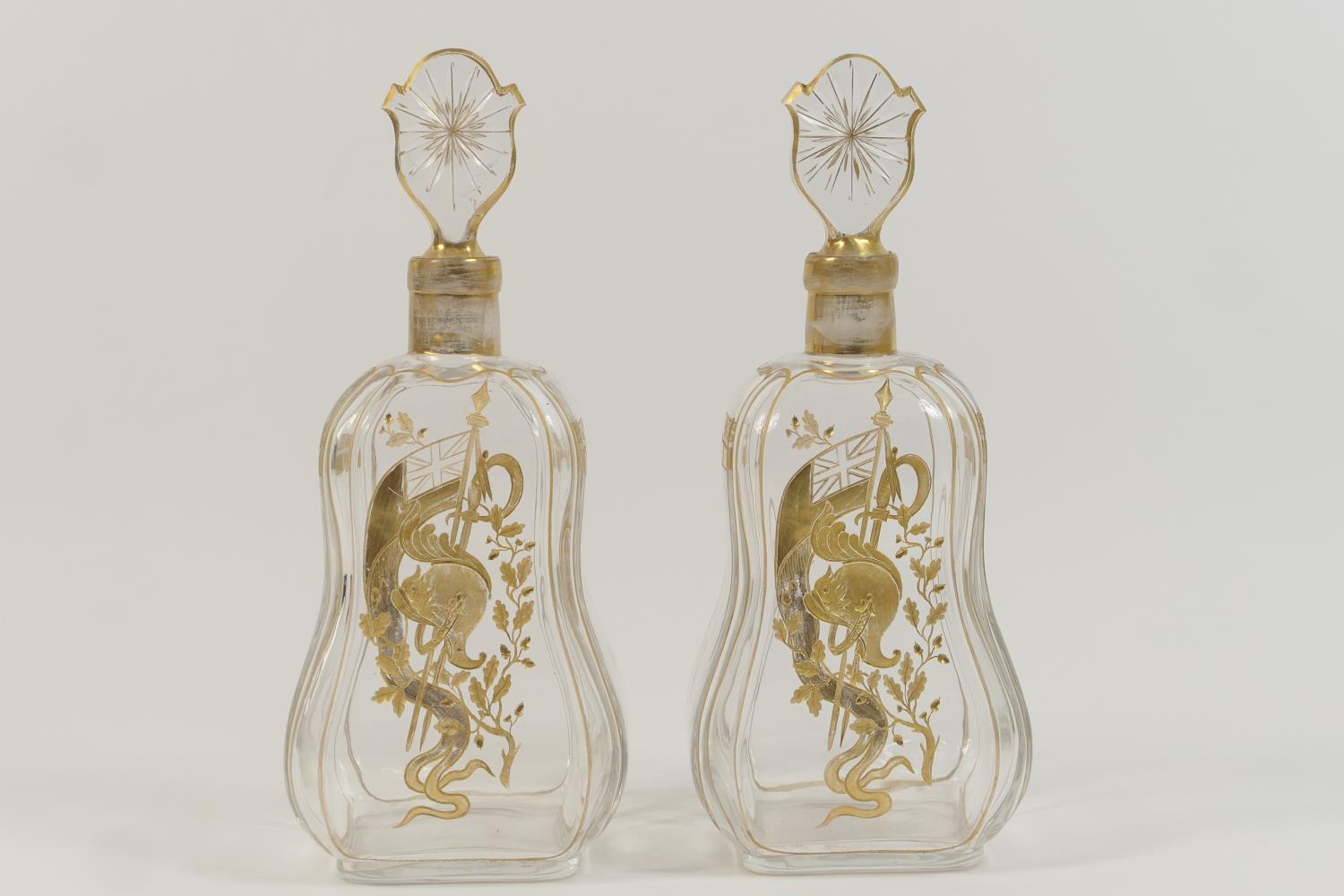 Pair of naval commissioned gilt engraved glass decanters, late 19th Century, each with star cut