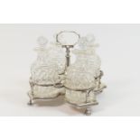 George III silver four bottle cruet, by Robert and Samuel Hennell, London 1805, supporting four