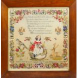 Victorian dated woollen needlework sampler by Ruth Laws, Aged 8, dated 1855, centred with a girl