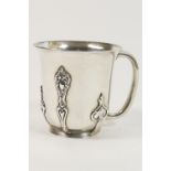 George V silver tankard, London 1918, with flared rim and a body embellished with vertilinear forms,