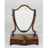 Mahogany shield shaped dressing table mirror, 19th Century, having a serpentine front base fitted