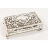 Edwardian silver box, Birmingham 1902, shallow rectangular form, repousse decorated with flowers and