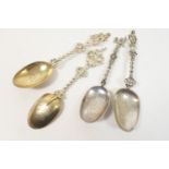 Four Dutch silver reproduction spoons, each with cast haft and the bowls engraved with crests with