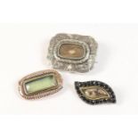 Three 19th Century 'In Memoriam' brooches comprising a rectangular shaped brooch with vacant