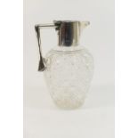 George V silver mounted cut glass claret jug, Birmingham 1925, the hobnail cut ovoid body with plain