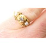 Late Victorian diamond and pearl ring, centred with a small old brilliant cut diamond, illusion