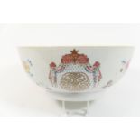 Chinese armorial marriage bowl, Qianlong (1736-95), decorated with two sets of arms and the