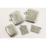 Late Victorian silver vesta case, Birmingham 1897, rectangular cushion form foliate engraved and