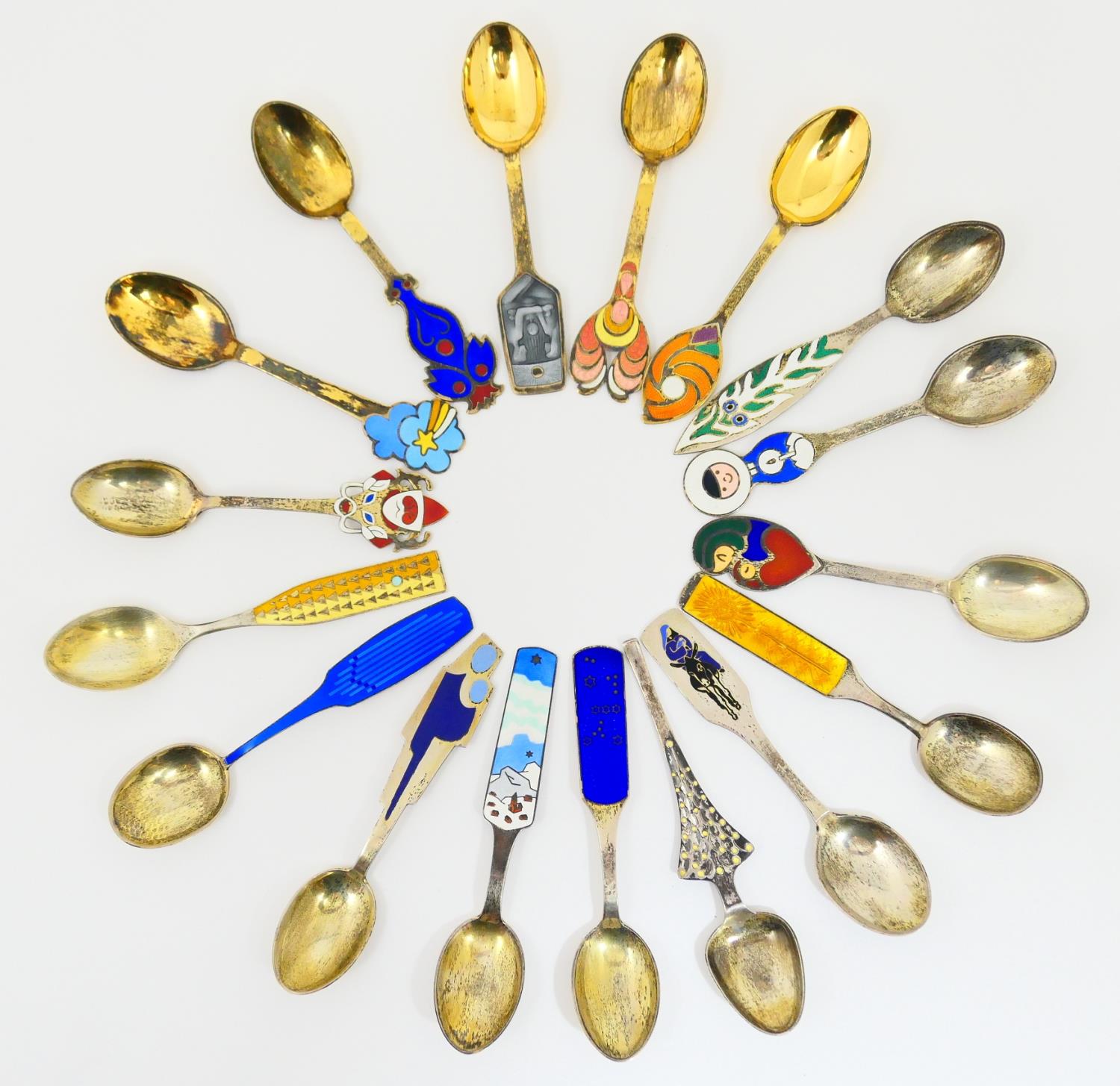 Collection of Danish silver and enamelled Christmas spoons, 1952, and 1960-1975 inclusive,