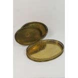 Set of three graduated galleried brass serving trays, the largest 41cm