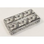 Continental white metal snuff box, rectangular form worked with fruiting vines, 8.5cm x 4.5cm