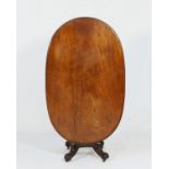 Victorian mahogany tilt top supper table, the re-shaped oval top tilting over an octagonal tapered