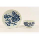 Worcester blue and white printed tea bowl and saucer, circa 1770, decorated with the Man in the