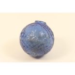Antique glass target ball, moulded in blue glass, with two shooting vignettes against a diamond
