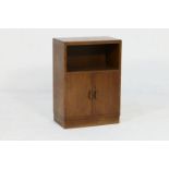 Heals (Tottenham Court Road, London), oak cabinet, having an open space above two cupboard doors,