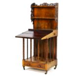 Unusual William IV rosewood canterbury writing table, having a back with two shelves with fretwork