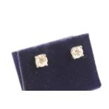 Pair of diamond ear studs, each round brilliant cut stone estimated as approx. 0.7ct, colour