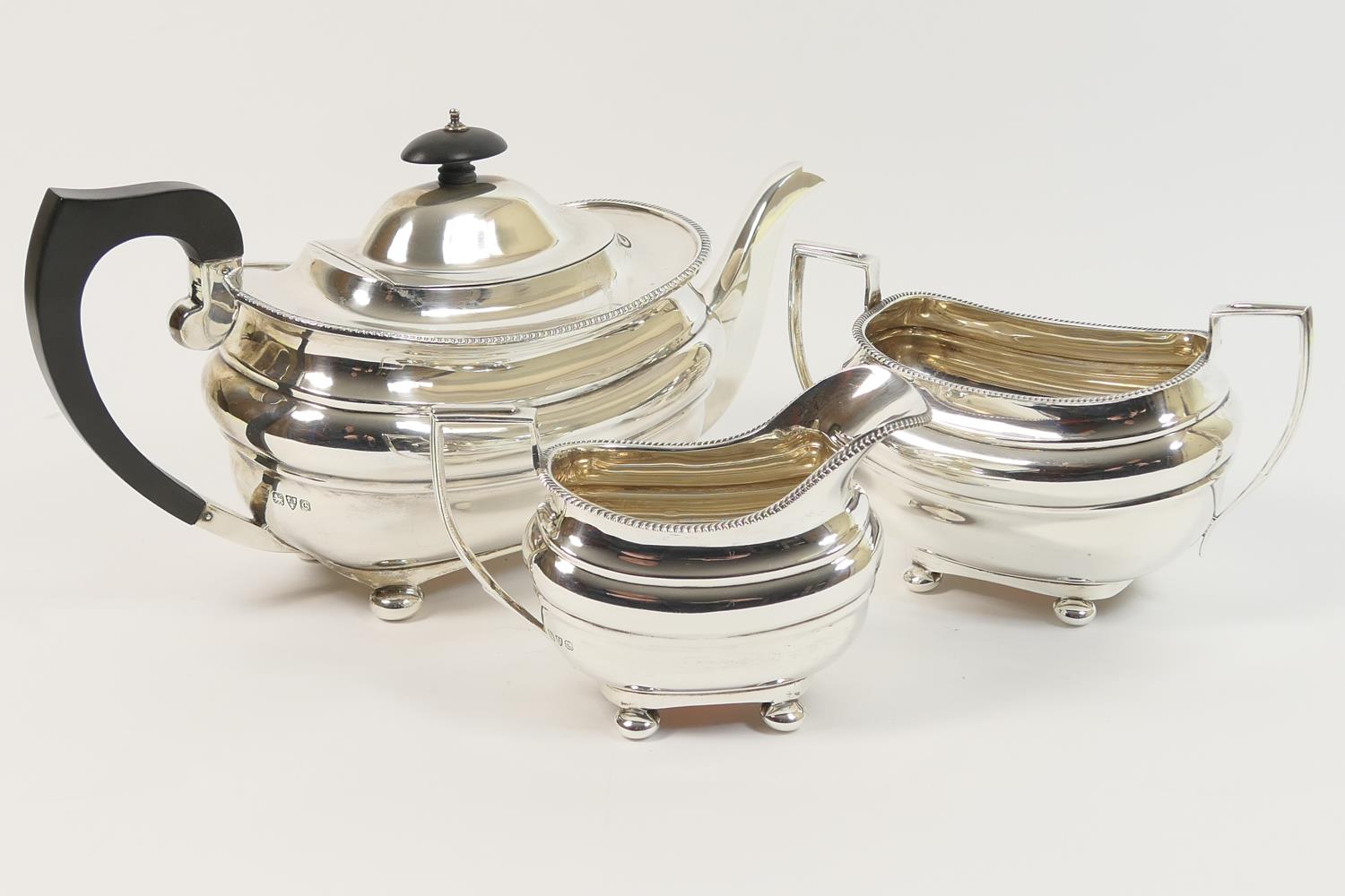 George V silver three piece tea service, by Blanckensee & Son, Chester 1932, in Georgian style of