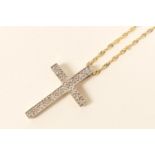 9ct gold diamond cross form pendant necklace, the pendant set with tiny round brilliants, channel