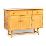 Ercol limed elm sideboard, early 1960s, fitted with one long and one short drawer, over three